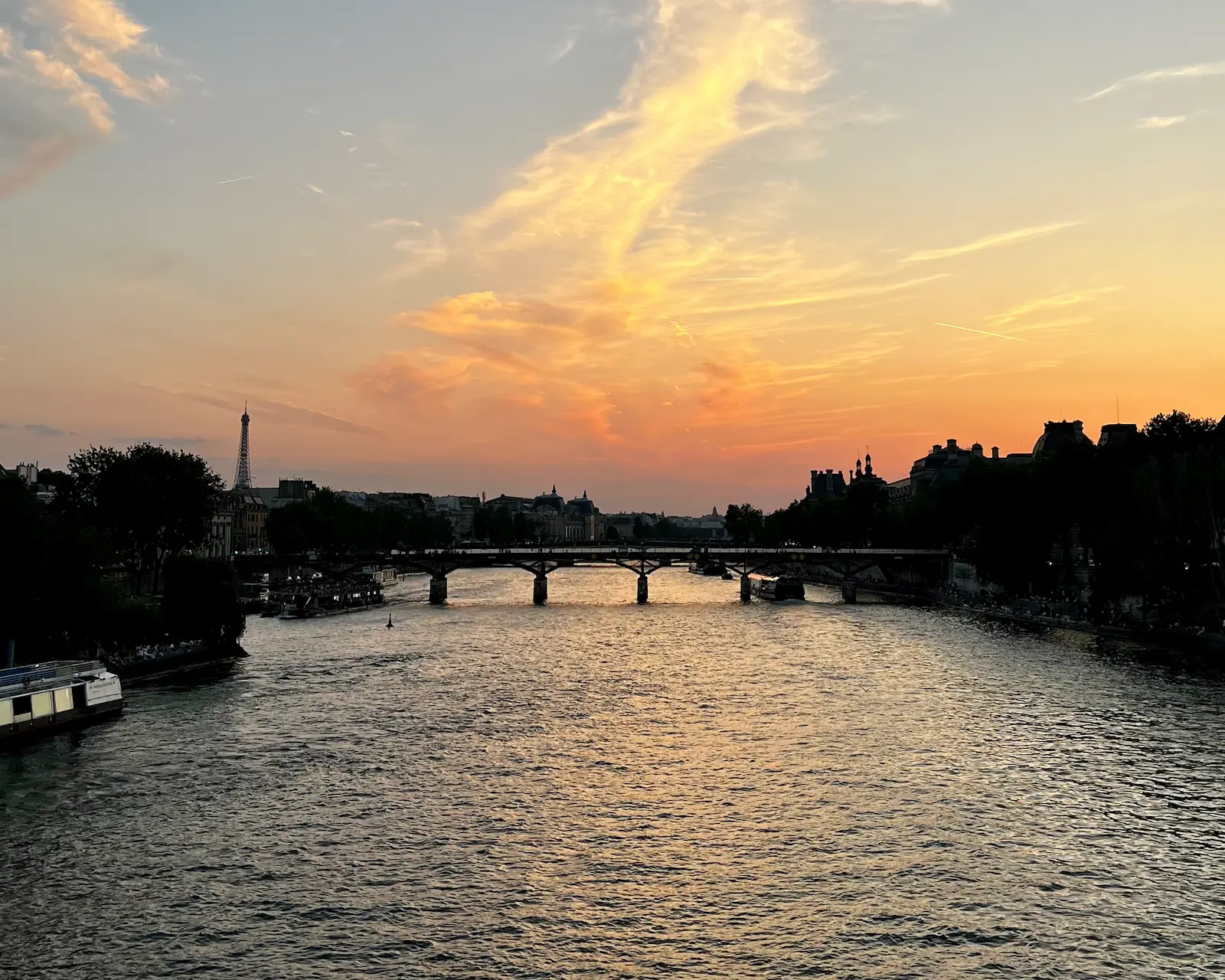 The Seine at sunset, the Eiffel Tower in the distance